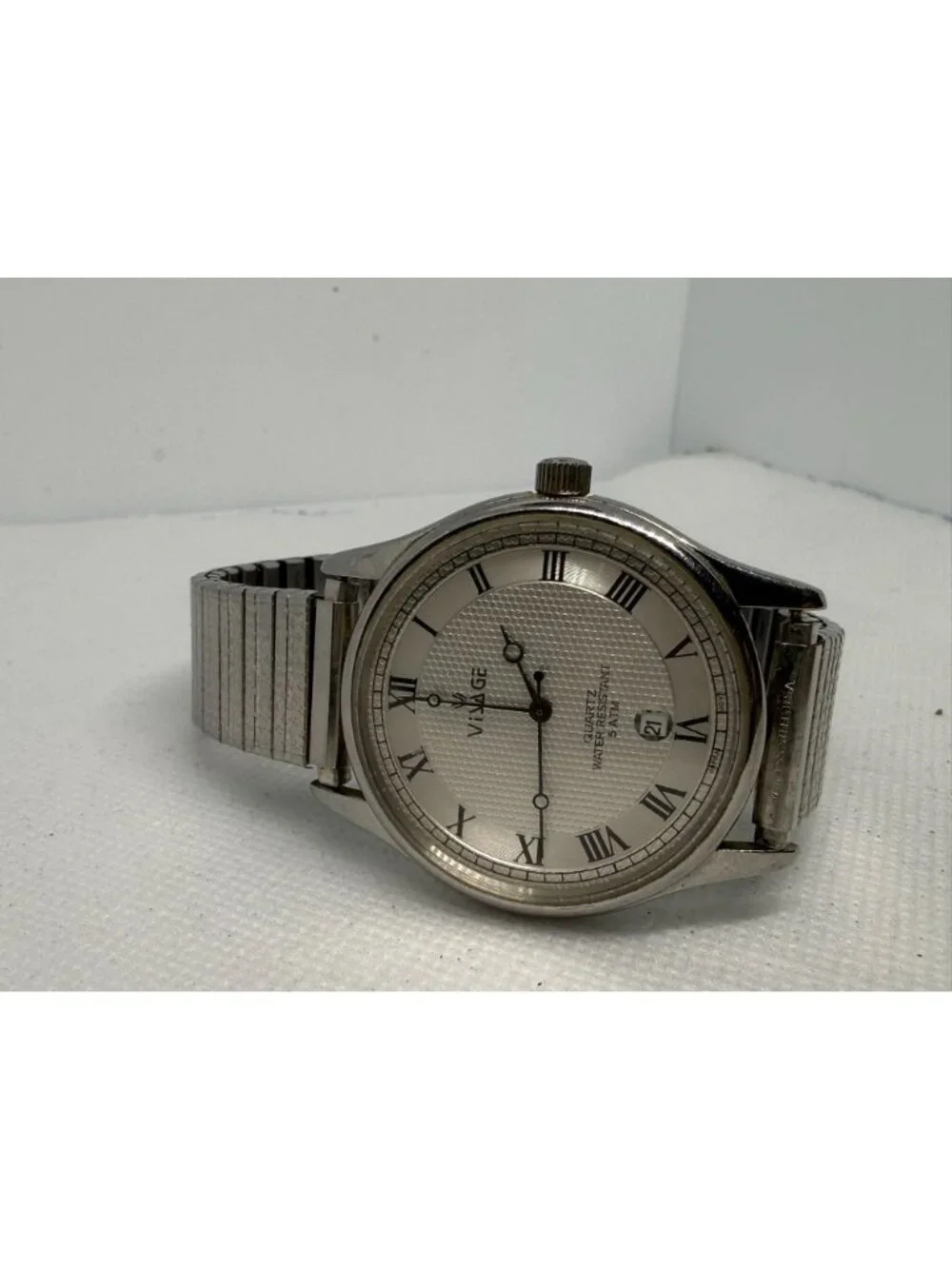 Visage Quartz Wristwatch Silver Dial Textured Center Roman Numerals 13370